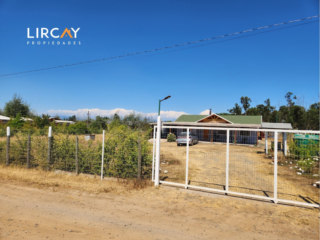 Parcela de 5.000 m² en San Rafael con Dos Casas Construidas y Terreno Plano