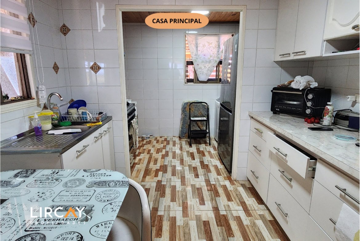 Parcela de 5.000 m² en San Rafael con Dos Casas Construidas y Terreno Plano
