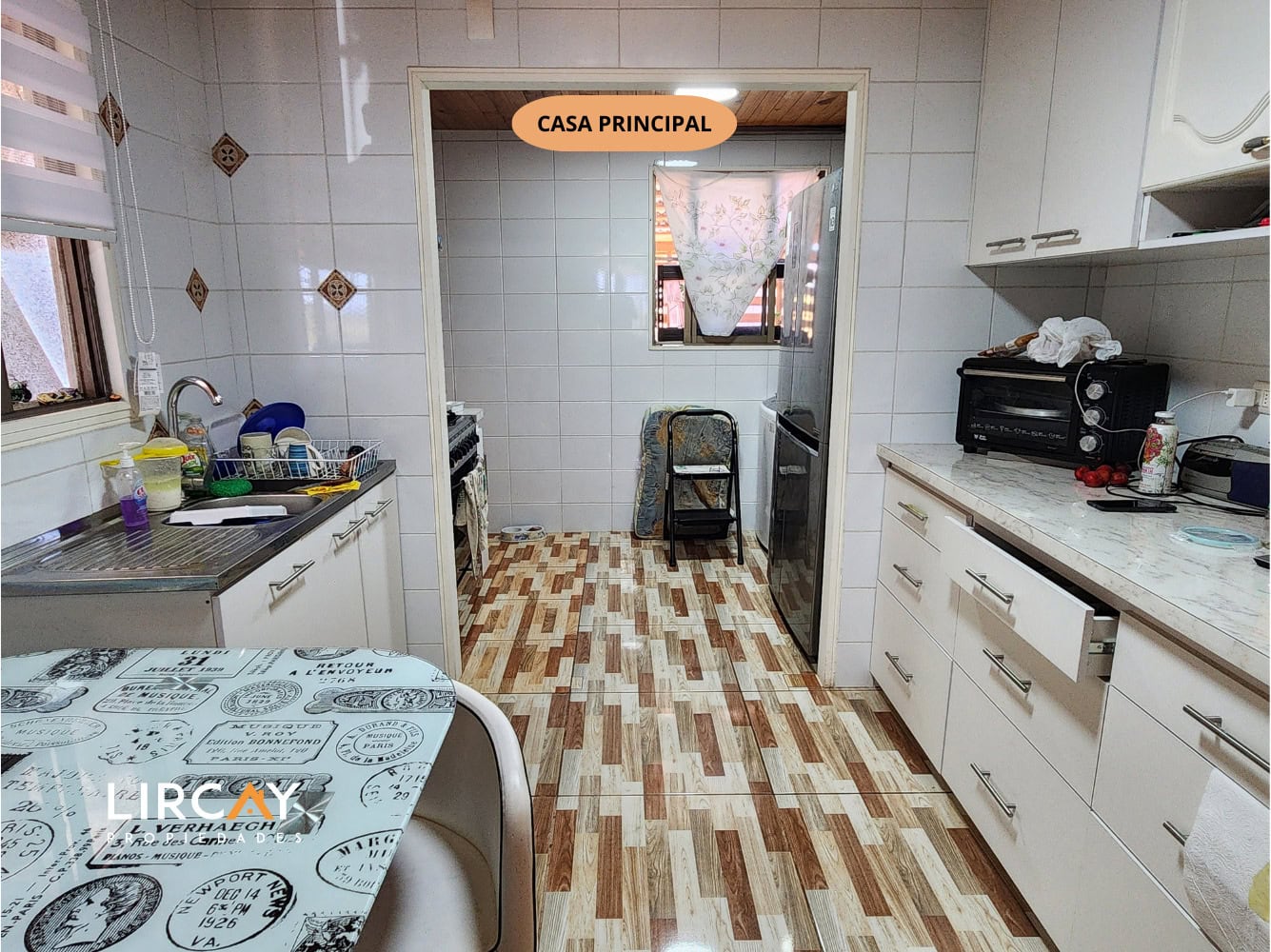Parcela de 5.000 m² en San Rafael con Dos Casas Construidas y Terreno Plano