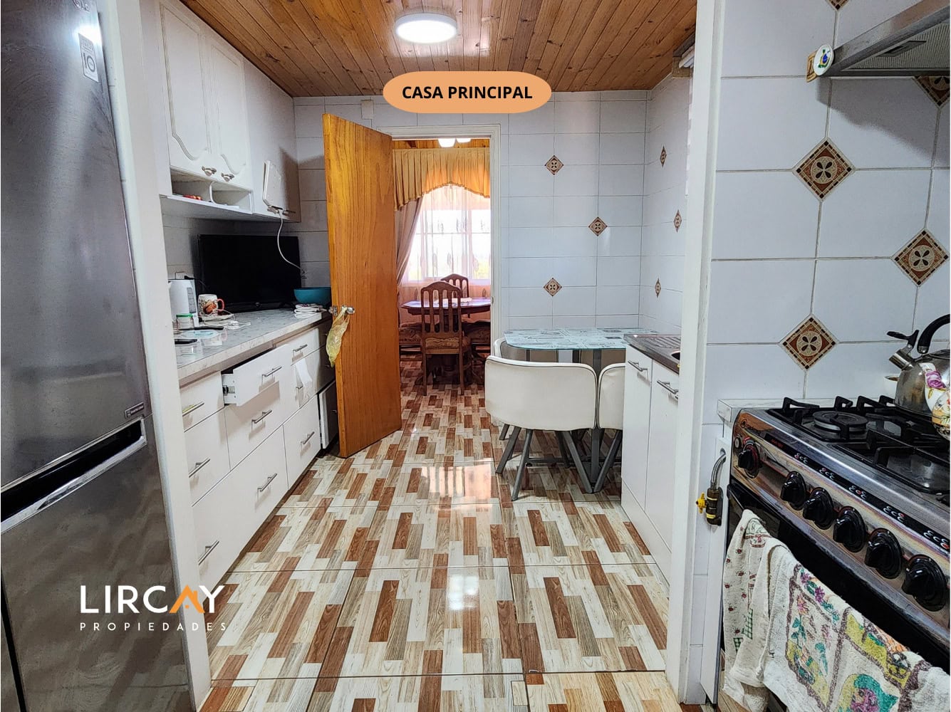 Parcela de 5.000 m² en San Rafael con Dos Casas Construidas y Terreno Plano
