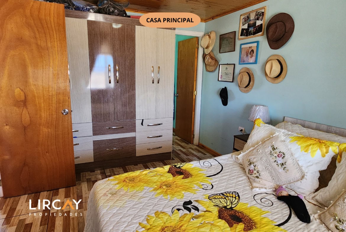 Parcela de 5.000 m² en San Rafael con Dos Casas Construidas y Terreno Plano