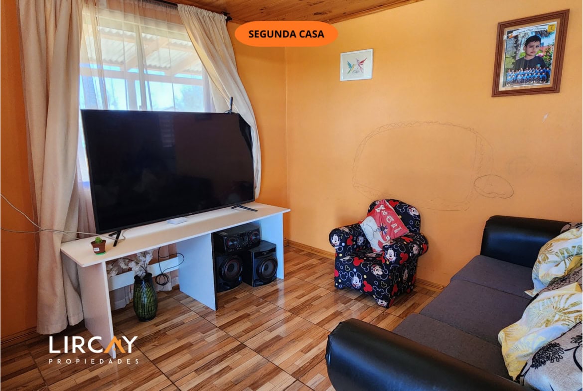 Parcela de 5.000 m² en San Rafael con Dos Casas Construidas y Terreno Plano