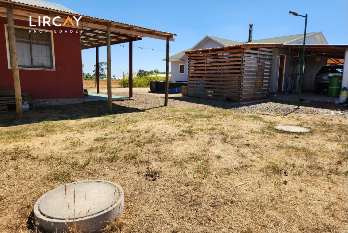 Parcela de 5.000 m² en San Rafael con Dos Casas Construidas y Terreno Plano