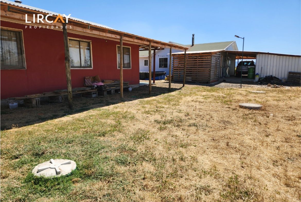 Parcela de 5.000 m² en San Rafael con Dos Casas Construidas y Terreno Plano