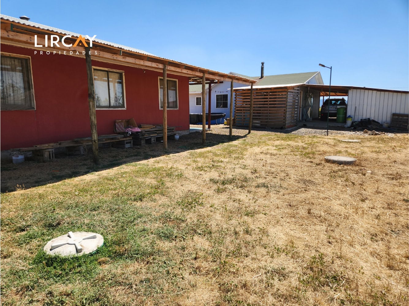 Parcela de 5.000 m² en San Rafael con Dos Casas Construidas y Terreno Plano