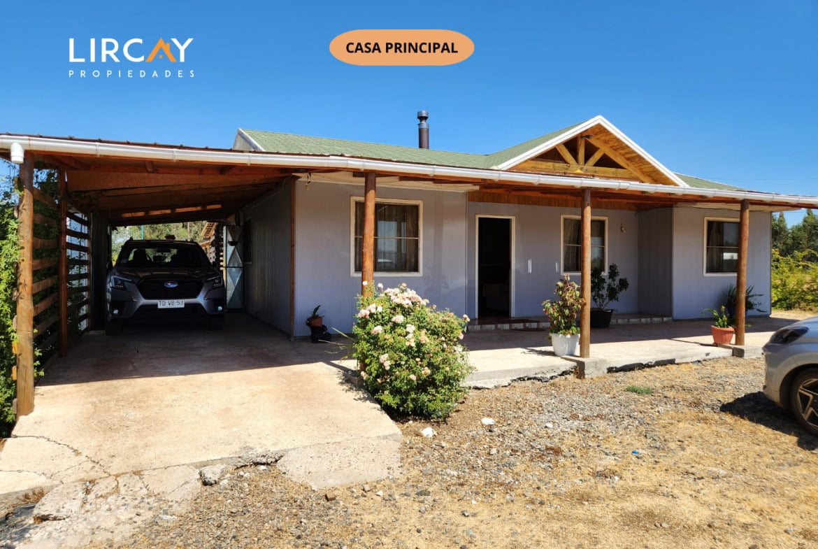 Parcela de 5.000 m² en San Rafael con Dos Casas Construidas y Terreno Plano