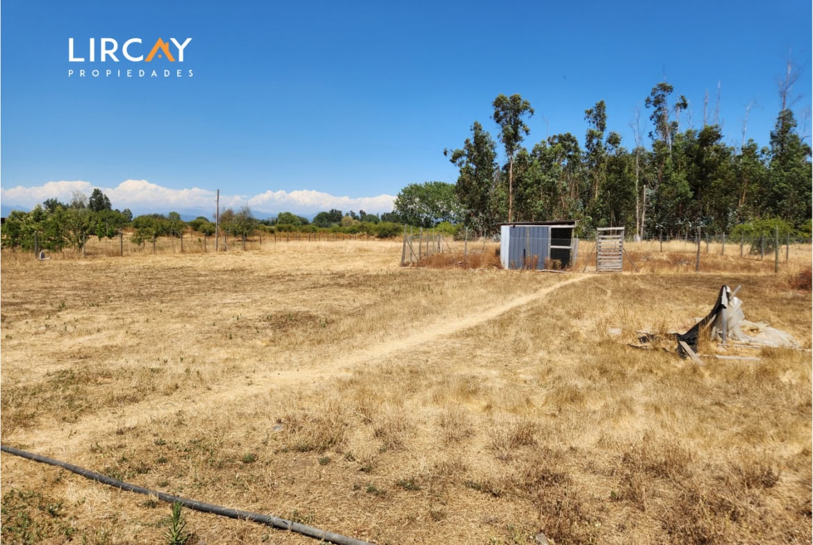 Parcela de 5.000 m² en San Rafael con Dos Casas Construidas y Terreno Plano