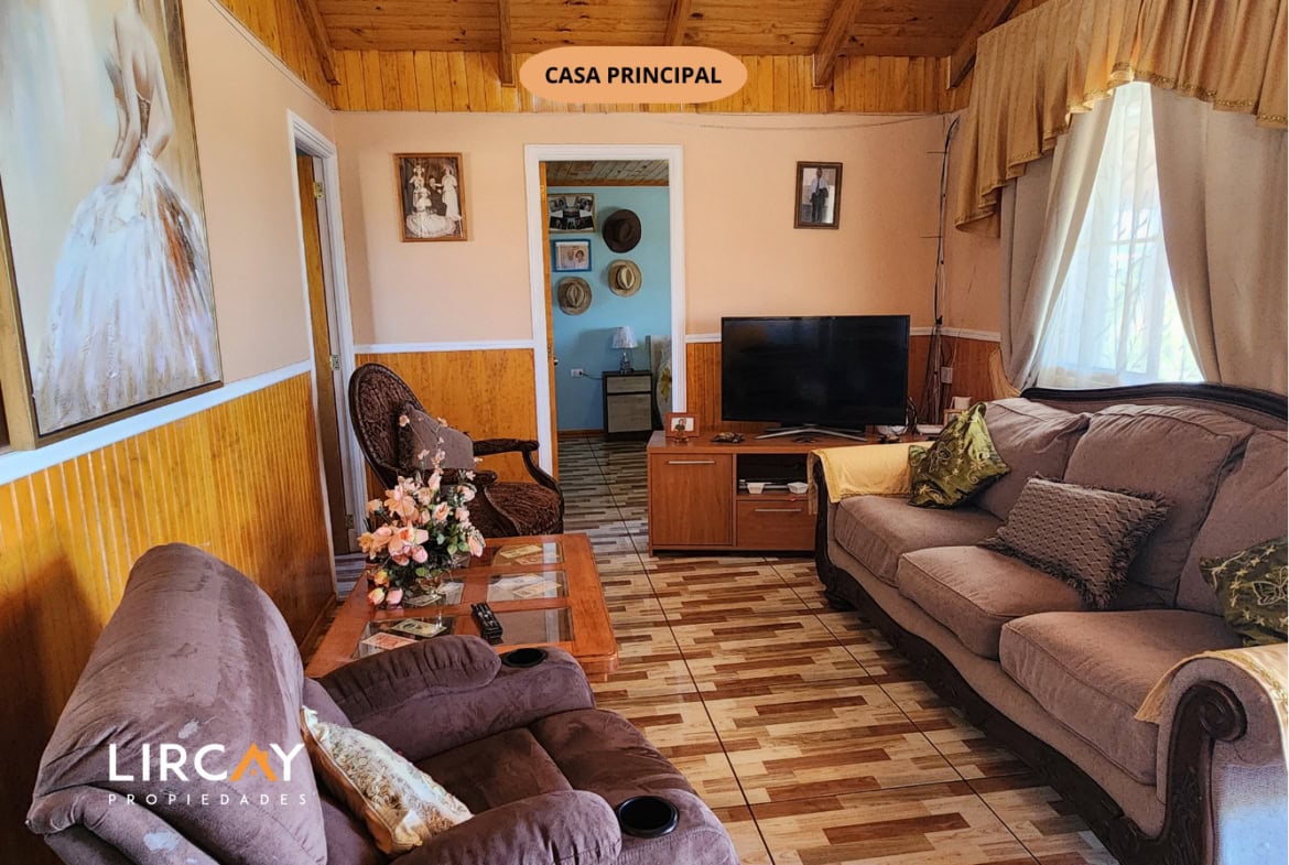 Parcela de 5.000 m² en San Rafael con Dos Casas Construidas y Terreno Plano