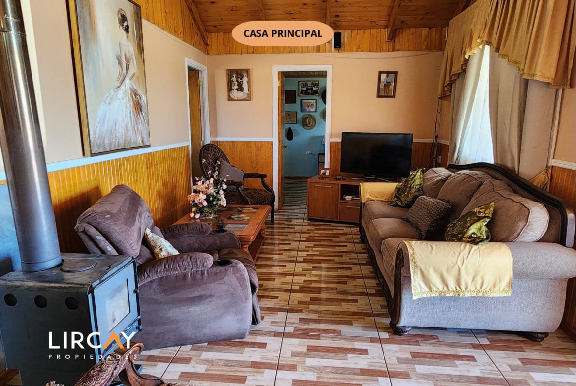 Parcela de 5.000 m² en San Rafael con Dos Casas Construidas y Terreno Plano